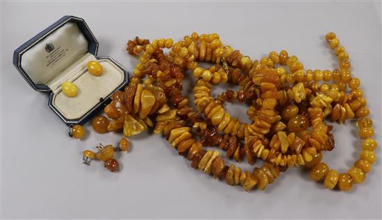 Five amber bead/fragment necklaces and three pairs of amber earrings, one other pair and a single earring.